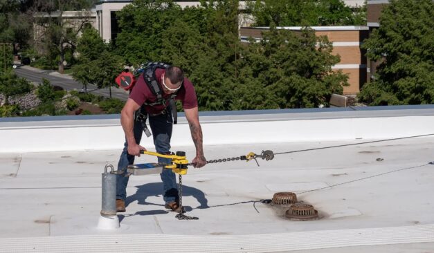 Roof anchor fall protection system installed on industrial rooftop in Ontario for safety and compliance inspections